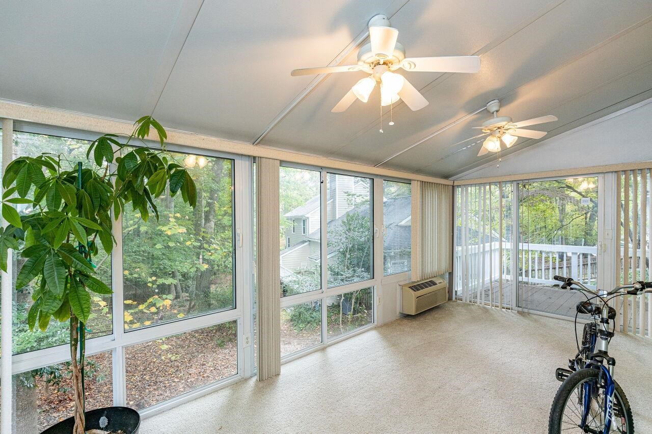 7811 Breckon Way Raleigh, NC 27615 - Photo 28 of 30 Expansive private wooded views from this heated and cooled sunroom. Sunroom