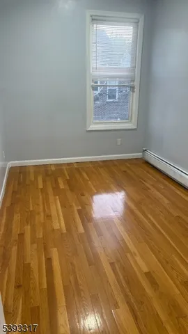 an empty room with a bed