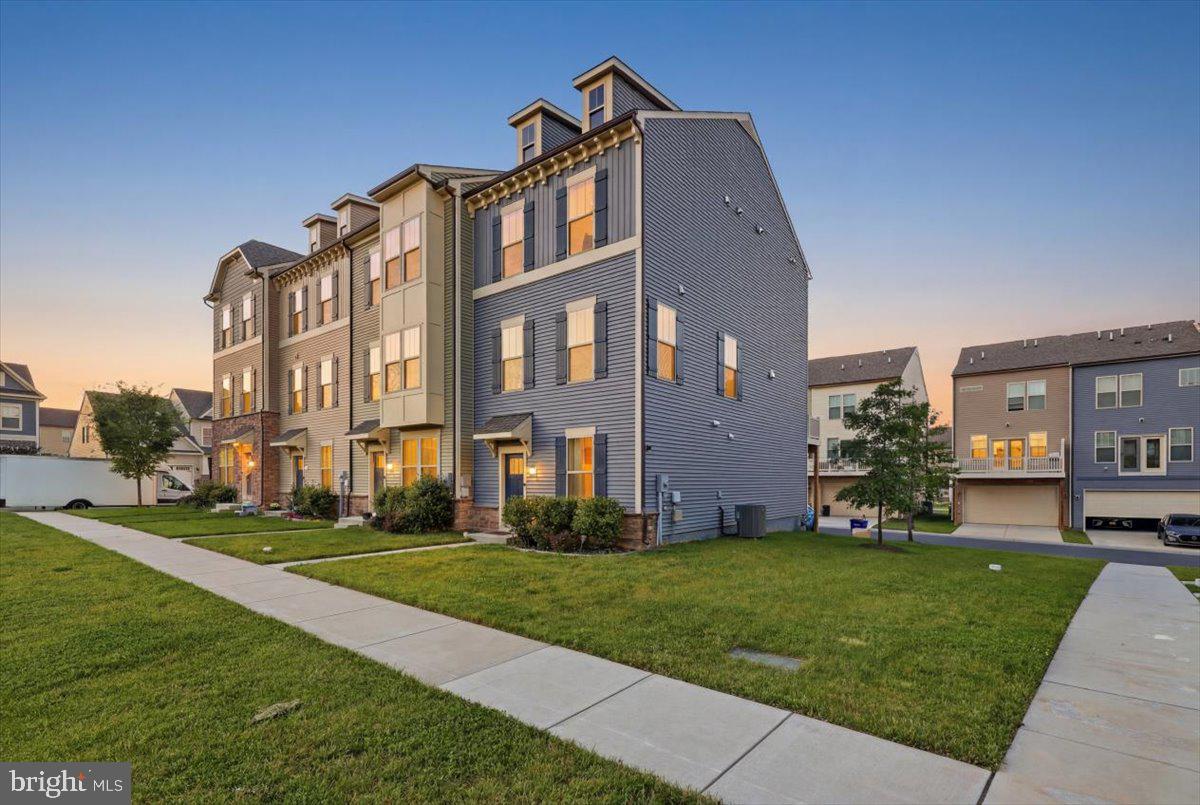 1833 Clancy Avenue Frederick, MD 21702 - Photo 3 of 43 Modern townhomes at sunset glow.