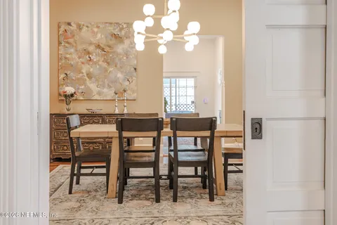 a bedroom with a bed and a fireplace