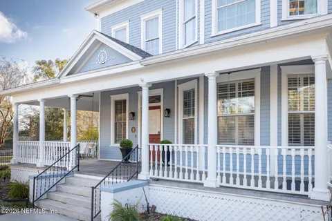 a kitchen with counter top space cabinets and appliances