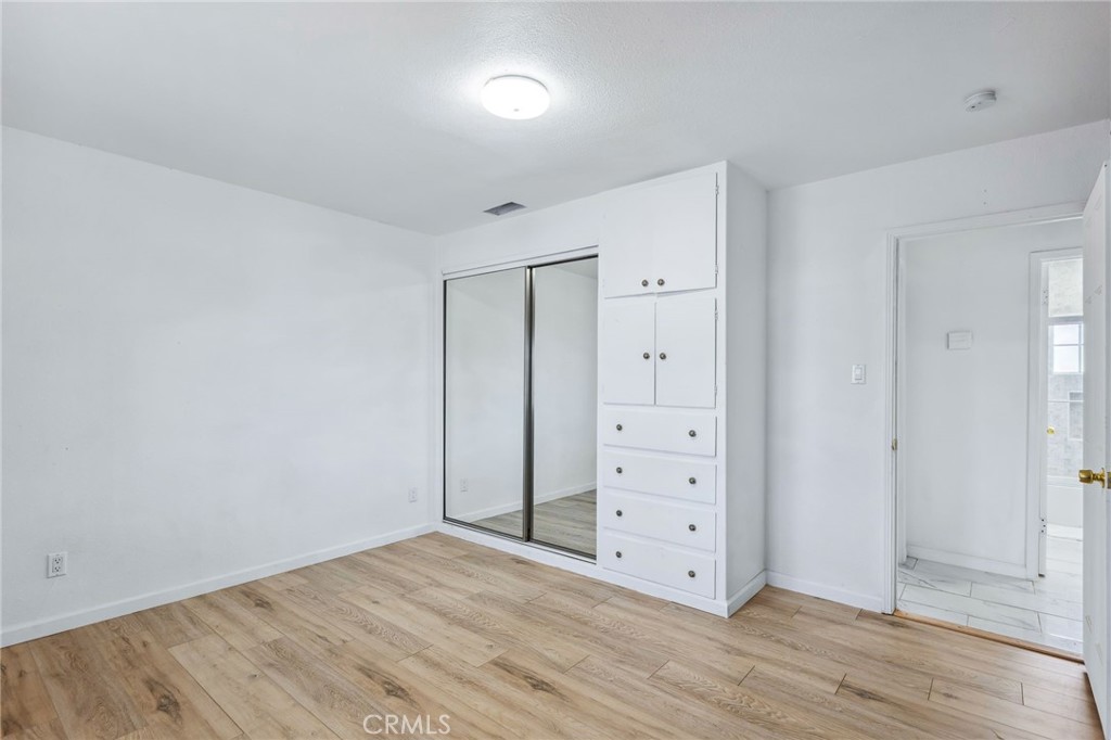 501 B Street Needles, CA 92363 - Photo 19 of 32 wooden floor with white walls