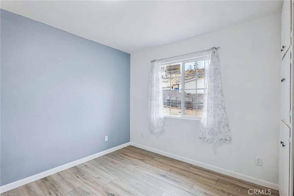 501 B Street Needles, CA 92363 - Photo 23 of 32 a view of an empty room with a window