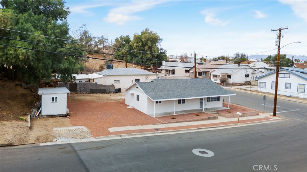 501 B Street Needles, CA 92363 - Photo 30 of 32 a aerial view of a house with a yard and sitting area