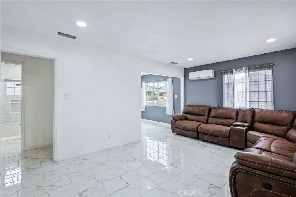 501 B Street Needles, CA 92363 - Photo 5 of 32 a living room with furniture and a window