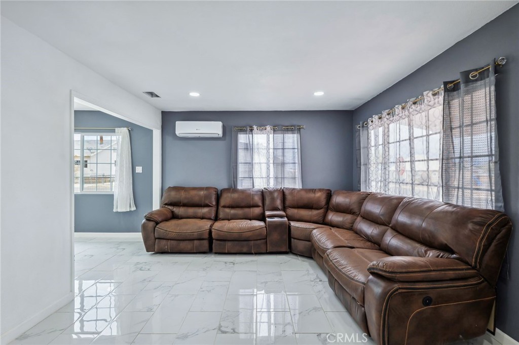501 B Street Needles, CA 92363 - Photo 6 of 32 a living room with furniture and a large window