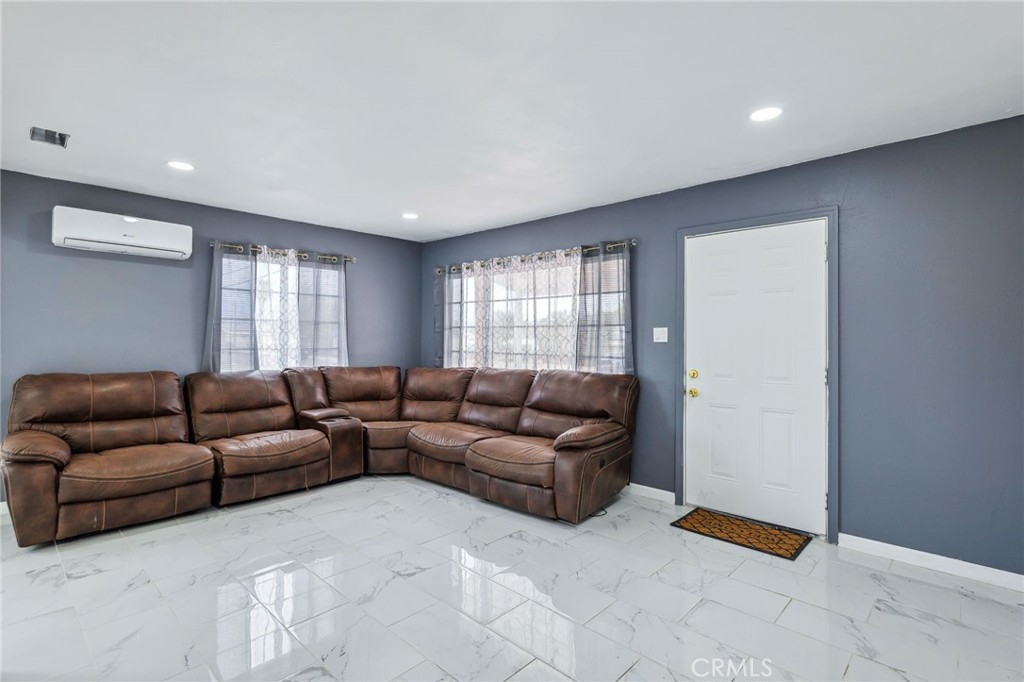 501 B Street Needles, CA 92363 - Photo 7 of 32 a living room with furniture and a window