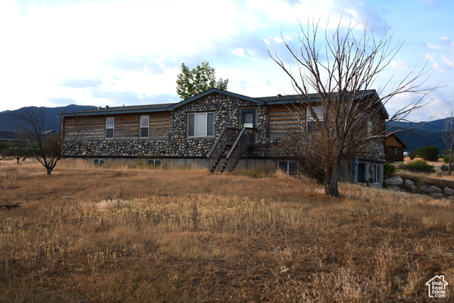 580 East 400 North Spring City, UT 84662 - Photo 39 of 40 Cabin featuring a mountain view and stone siding