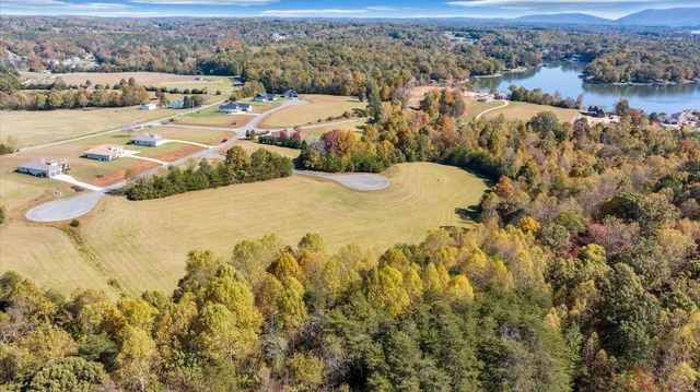 an aerial view of a house with outdoor space