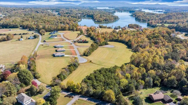 an aerial view of a house with a swimming pool
