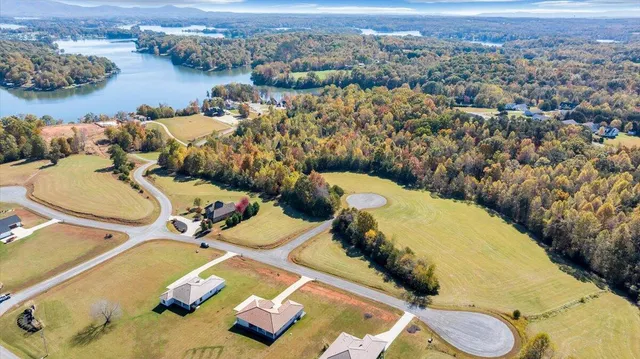 an aerial view of a house with outdoor space