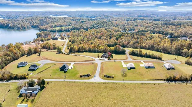 a view of swimming pool with a yard