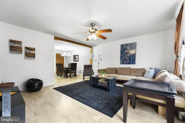 a living room with furniture and a table