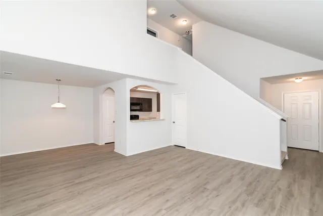a view of a big room with wooden floor