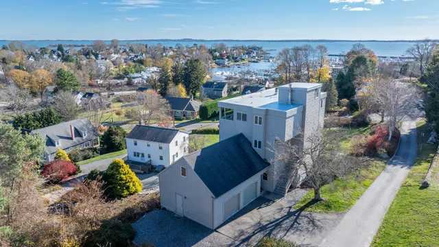 an aerial view of a house with a garden