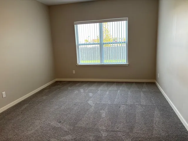 an empty room with a window