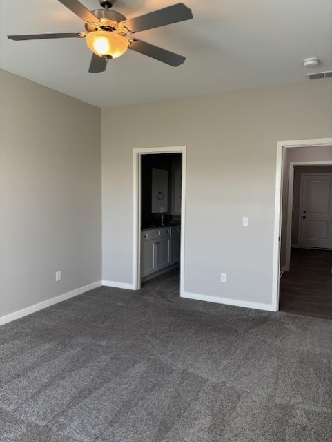 608 Anjali Court, Unit L Sycamore, IL 60178 - Photo 19 of 26 a view of an empty room with a bathroom