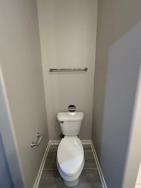 608 Anjali Court, Unit L Sycamore, IL 60178 - Photo 23 of 26 a bathroom with a toilet