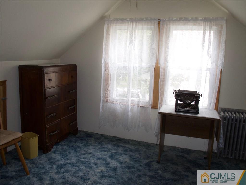 1707 Holly Road North Brunswick, NJ 08902 - Photo 14 of 21 a view of workspace with window and cabinet