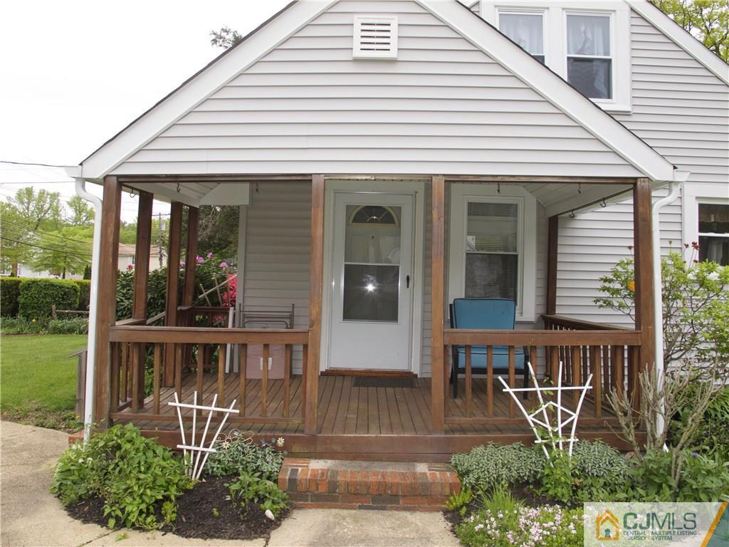 1707 Holly Road North Brunswick, NJ 08902 - Photo 20 of 21 a front view of a house with garden