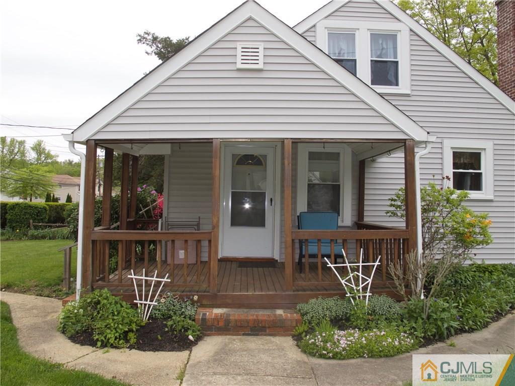 1707 Holly Road North Brunswick, NJ 08902 - Photo 21 of 21 a view of a house with porch and garden