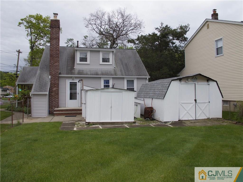 1707 Holly Road North Brunswick, NJ 08902 - Photo 5 of 21 a view of house with backyard