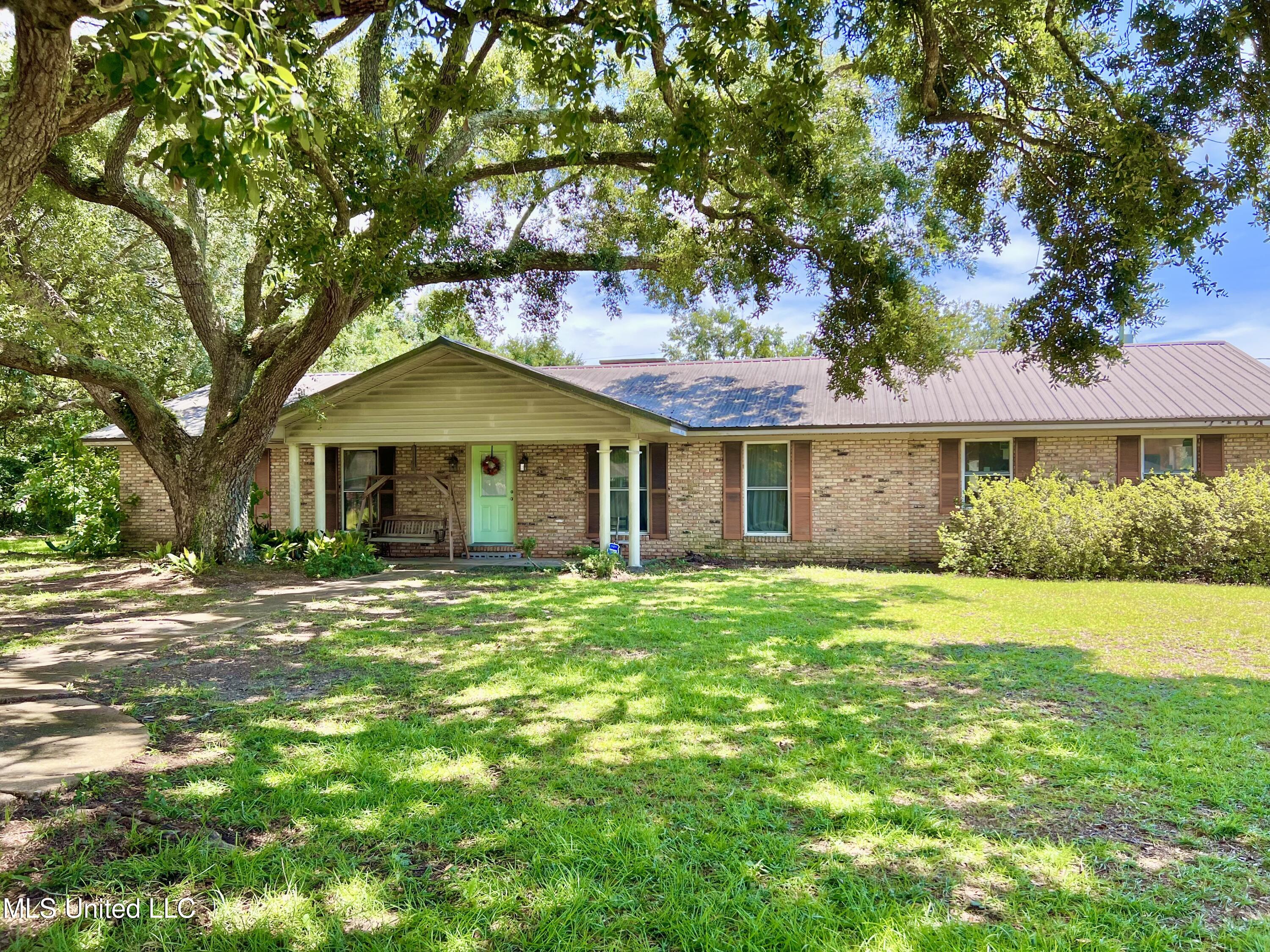 7904 Pointe Aux Chenes Road Ocean Springs, MS 39564 - Photo 1 of 21 Front Facing View of House