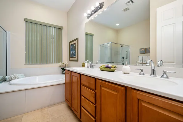 a bedroom with bed and a window