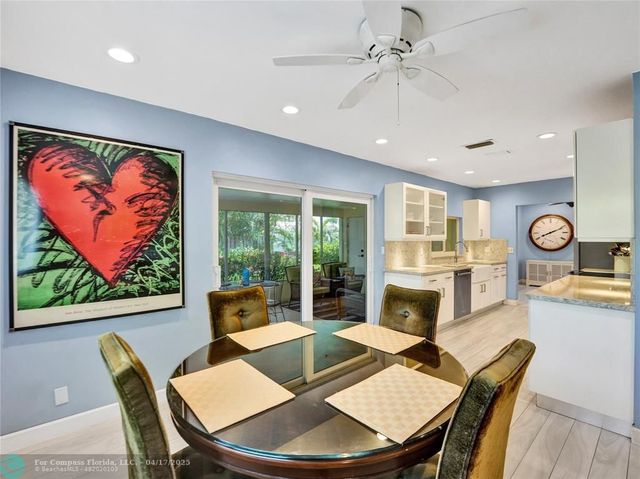 a workspace with furniture window and wooden floor
