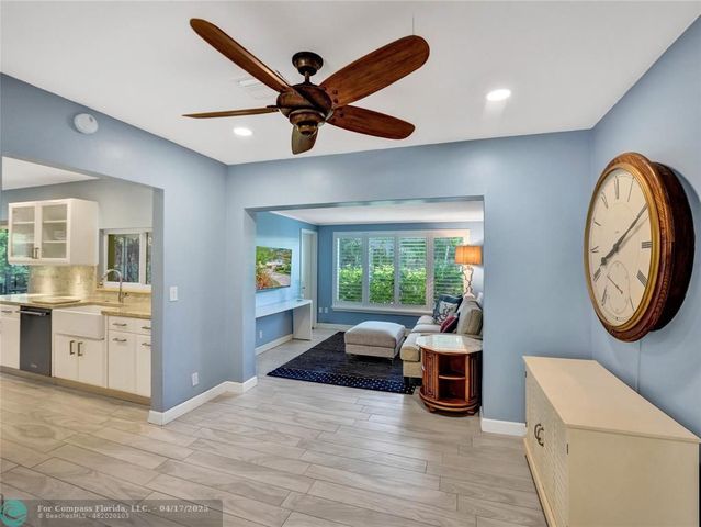 a room with furniture and a large window