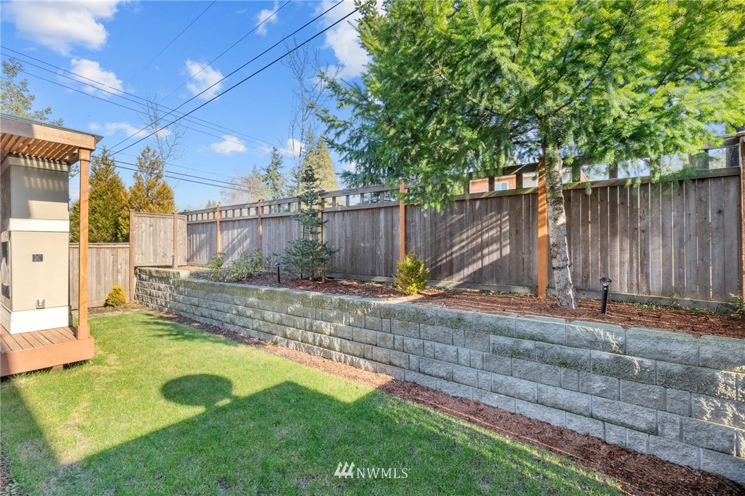 19208 101st Place Southeast Renton, WA 98055 - Photo 34 of 36 a view of a backyard with a small cabin