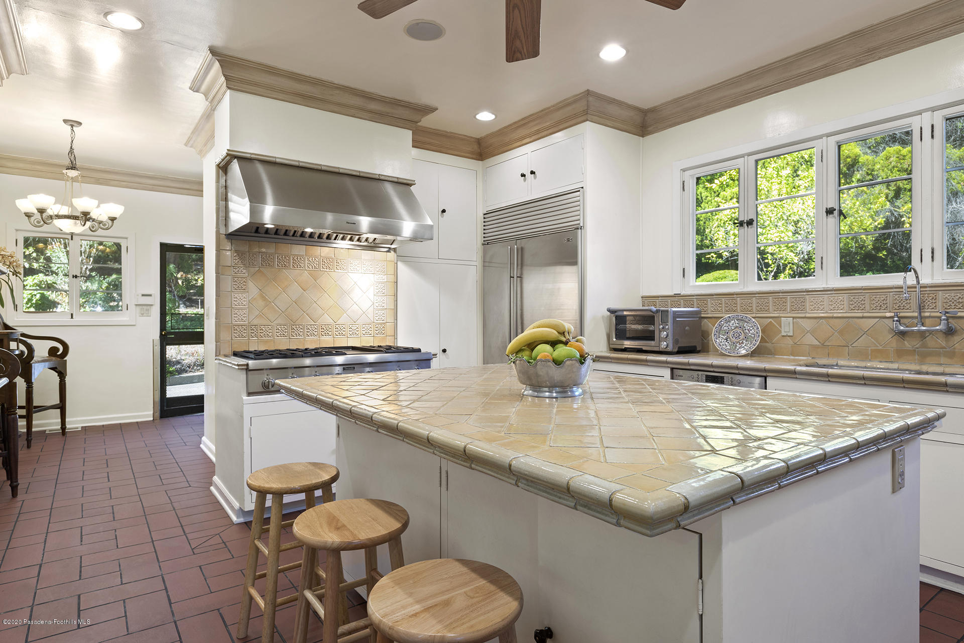 2288 Villa Heights Road Pasadena, CA 91107 - Photo 16 of 78 a kitchen with stainless steel appliances granite countertop a sink a stove and a wooden floors