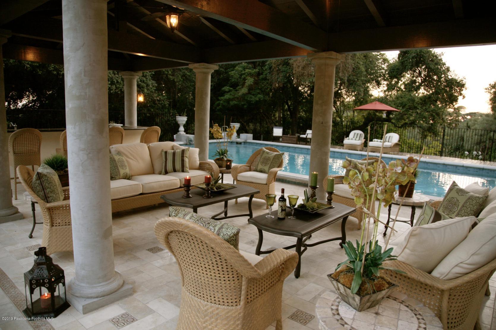 2288 Villa Heights Road Pasadena, CA 91107 - Photo 37 of 78 a view of a patio with couches potted plants and a patio
