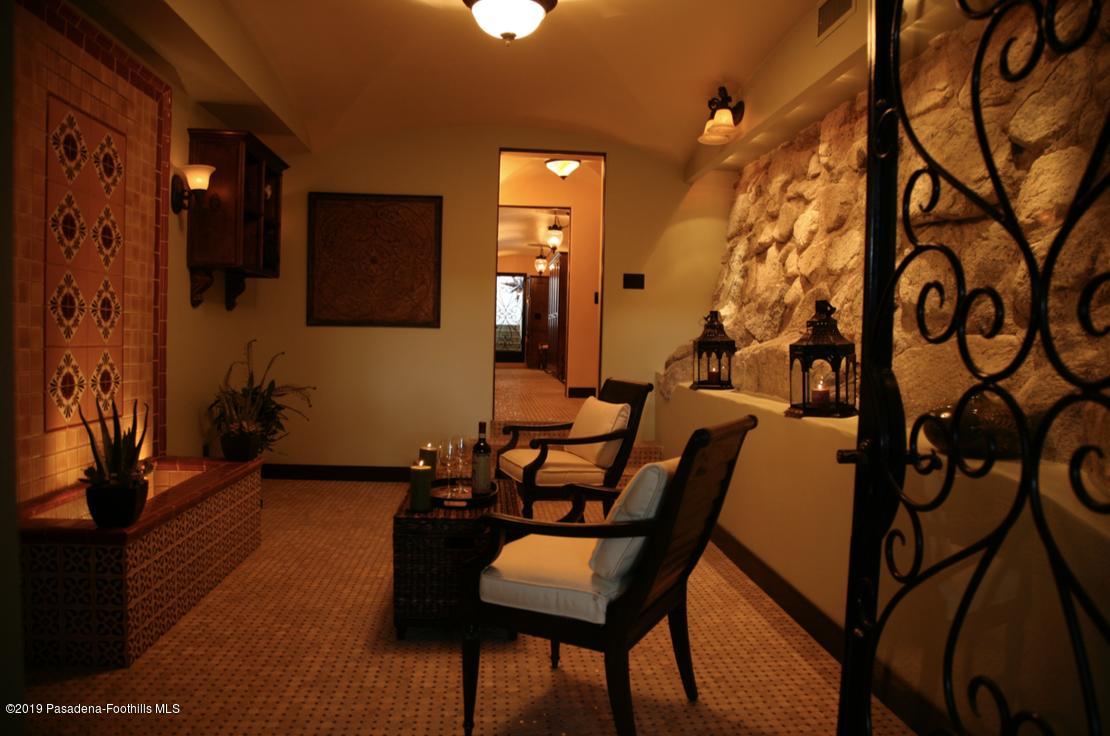 2288 Villa Heights Road Pasadena, CA 91107 - Photo 50 of 78 a living room with furniture and a chandelier