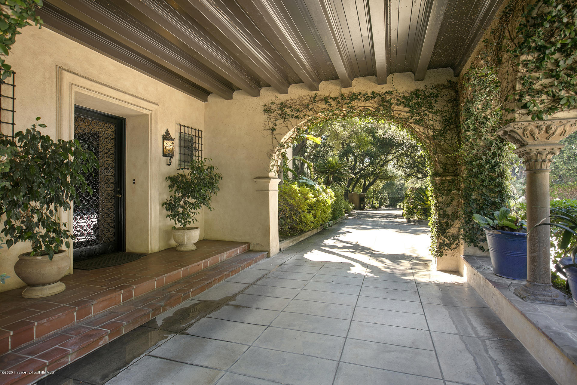 2288 Villa Heights Road Pasadena, CA 91107 - Photo 6 of 78 a view of a porch with potted plants