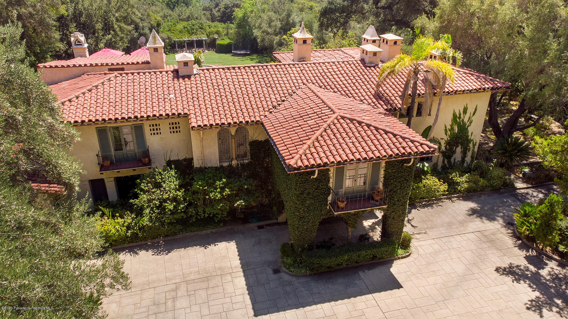 2288 Villa Heights Road Pasadena, CA 91107 - Photo 75 of 78 a view of a patio with a table and chairs and potted plants