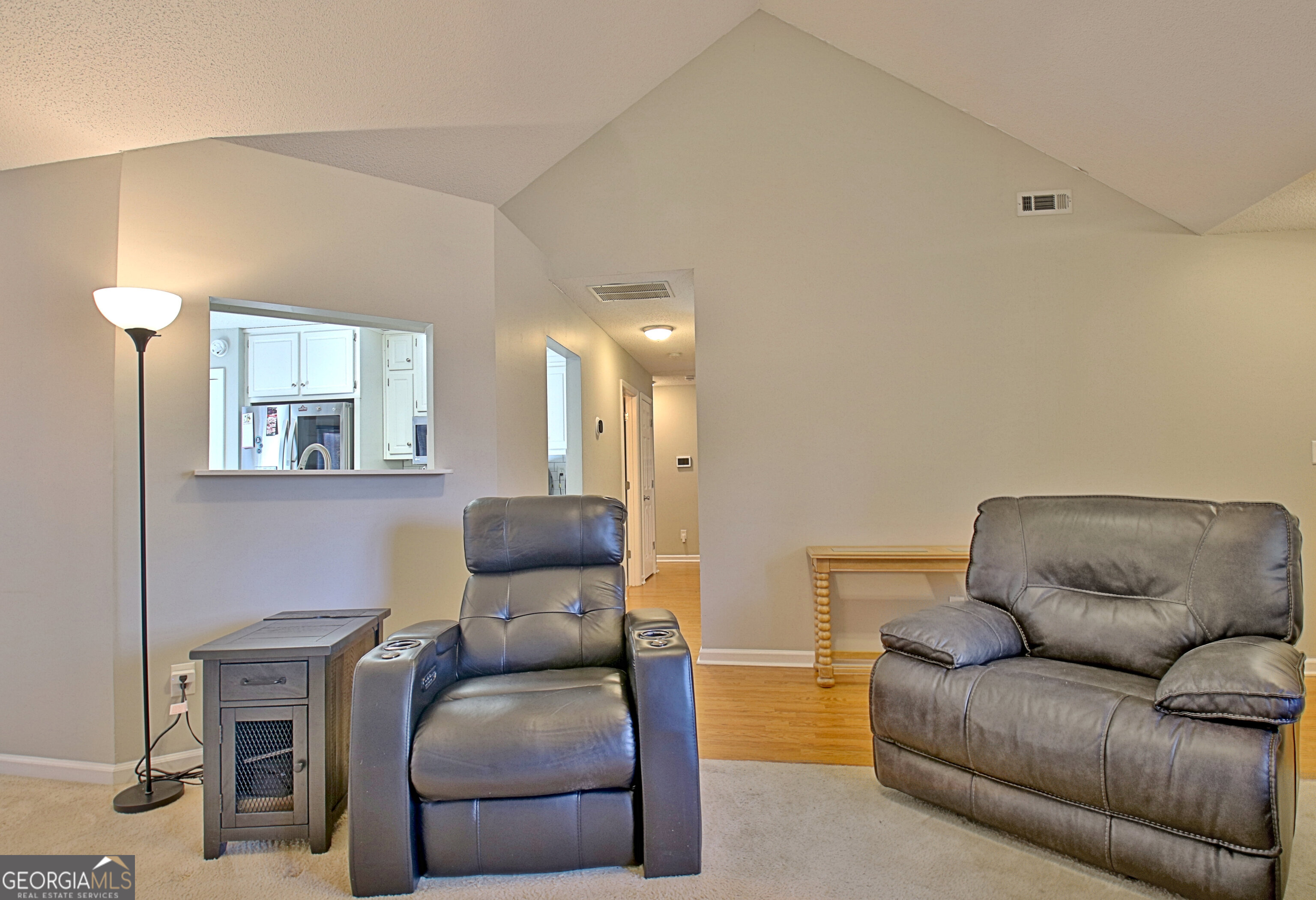 104 Blue Ridge Drive Newnan, GA 30265 - Photo 14 of 60 a living room with furniture and a couch