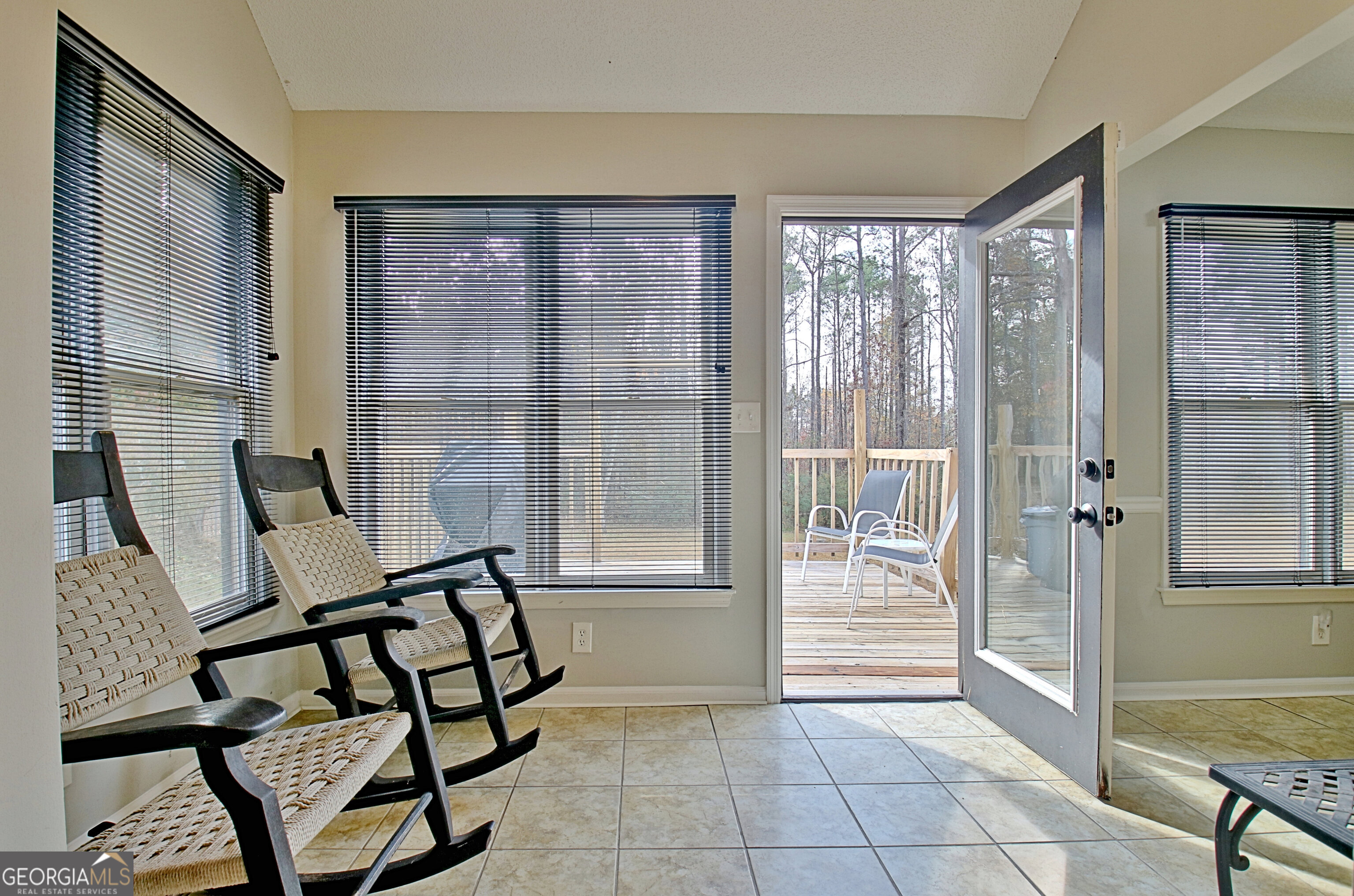 104 Blue Ridge Drive Newnan, GA 30265 - Photo 17 of 60 a view of a room with furniture and a large window