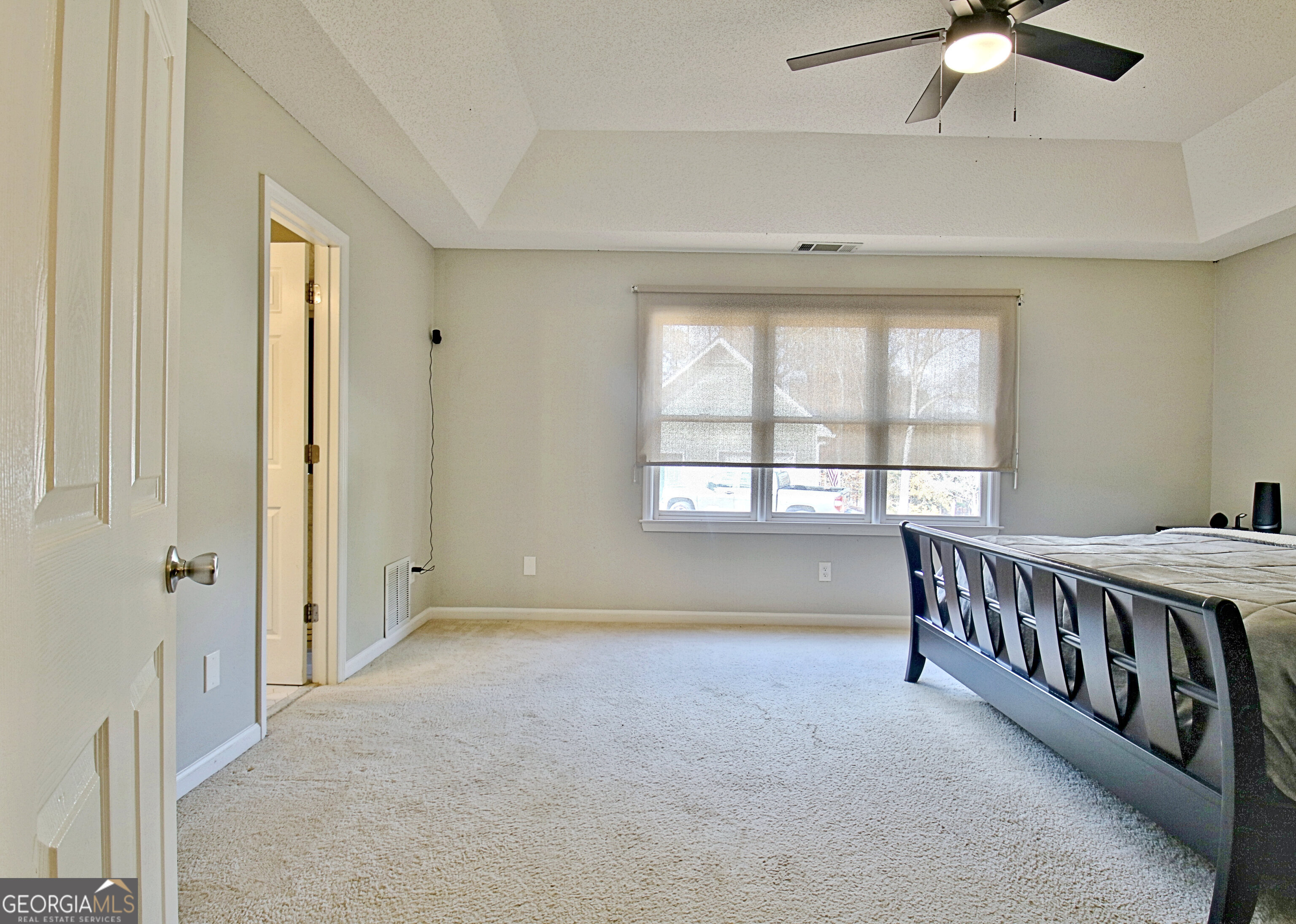 104 Blue Ridge Drive Newnan, GA 30265 - Photo 30 of 60 a view of an empty room with a window