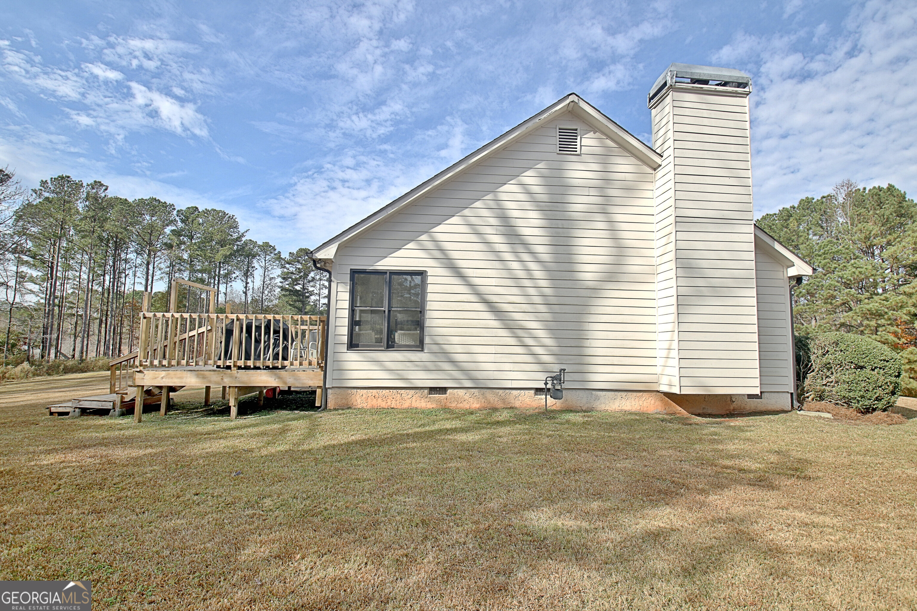 104 Blue Ridge Drive Newnan, GA 30265 - Photo 51 of 60 a view of a house with a yard and sitting area