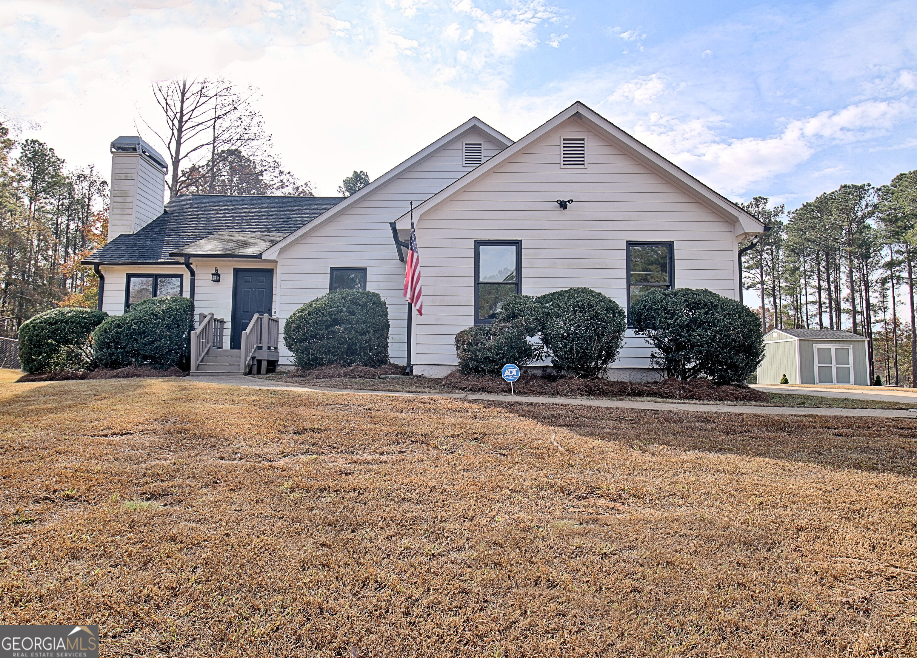 104 Blue Ridge Drive Newnan, GA 30265 - Photo 6 of 60 front view of a house and a yard