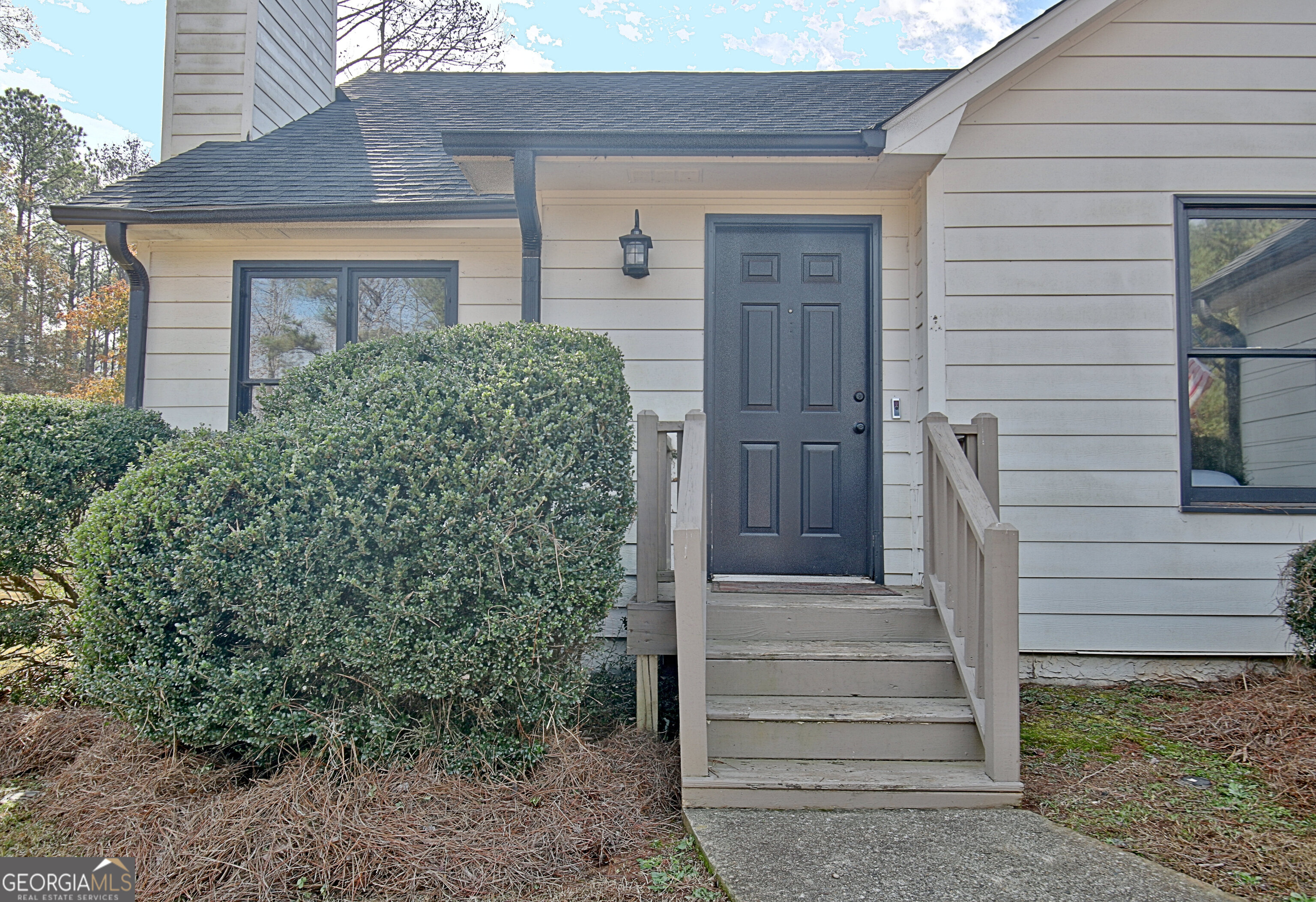 104 Blue Ridge Drive Newnan, GA 30265 - Photo 9 of 60 a front view of a house with a yard