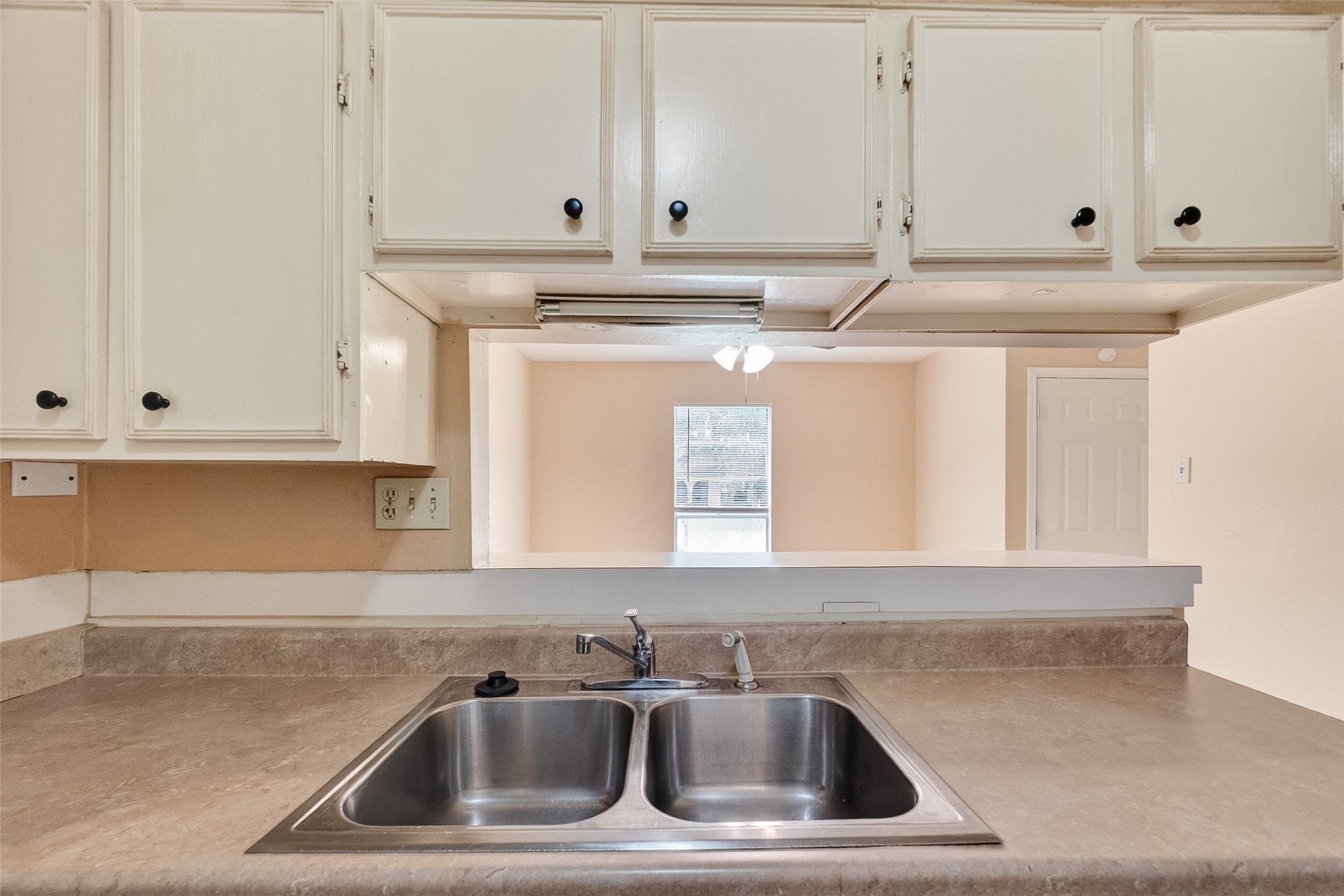 4826 Redfish Reef Drive Bacliff, TX 77518 - Photo 11 of 25 a bathroom with a sink and a mirror