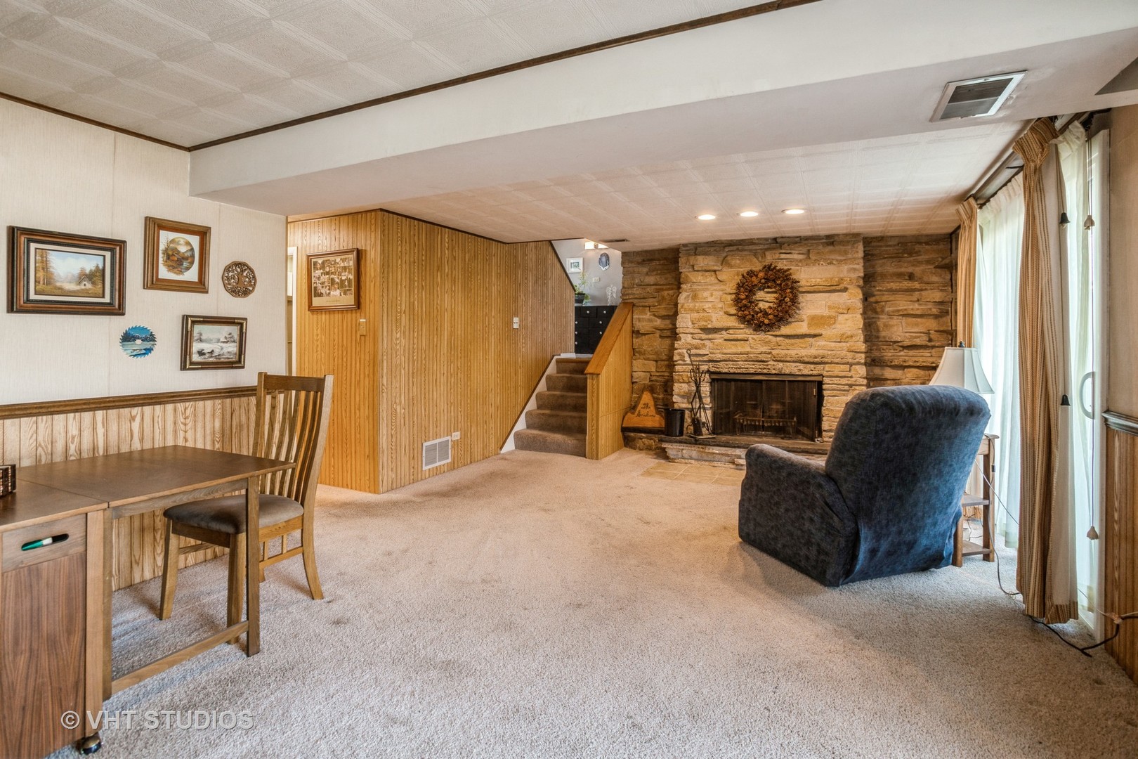 600 Edgemont Lane Hoffman Estates, IL 60169 - Photo 15 of 21 a living room with furniture and a flat screen tv