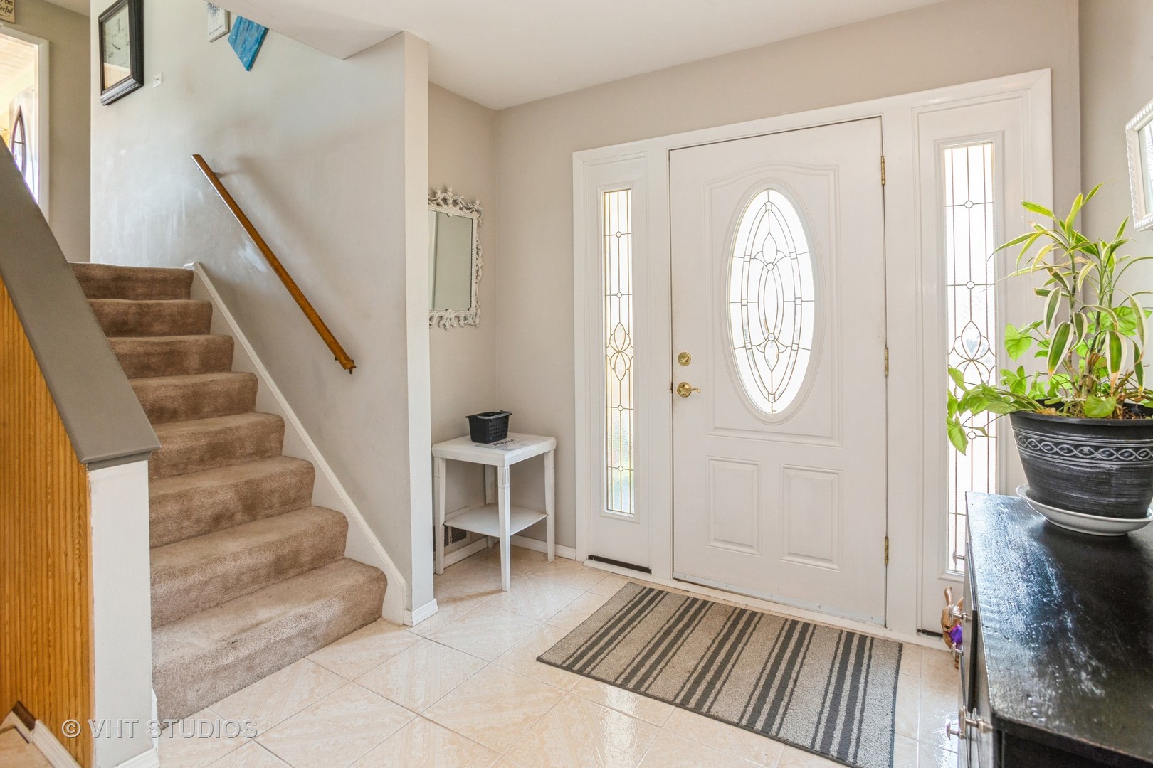 600 Edgemont Lane Hoffman Estates, IL 60169 - Photo 2 of 21 a view of a hallway with wooden floor and entryway