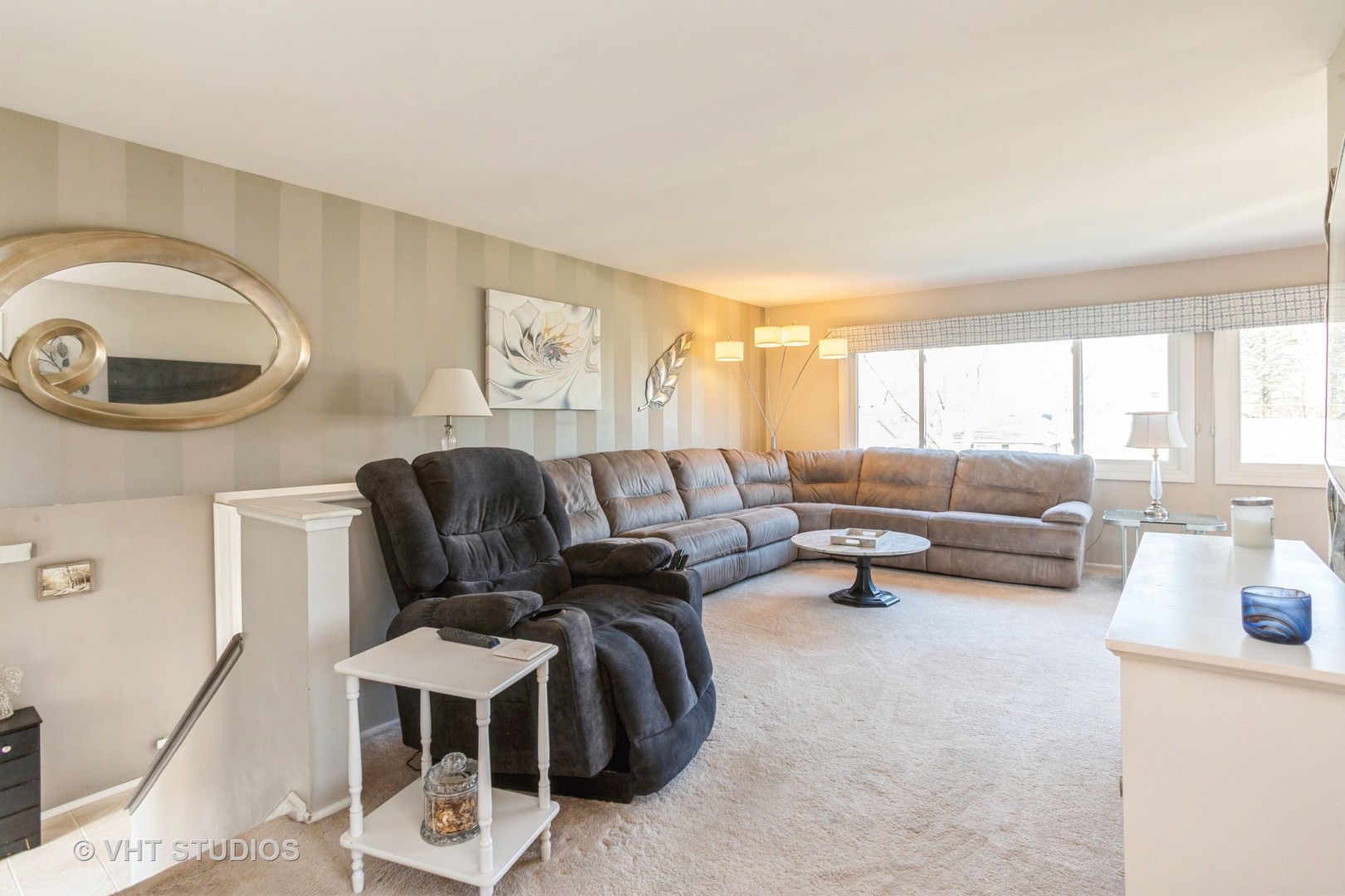 600 Edgemont Lane Hoffman Estates, IL 60169 - Photo 4 of 21 a living room with furniture and a large window