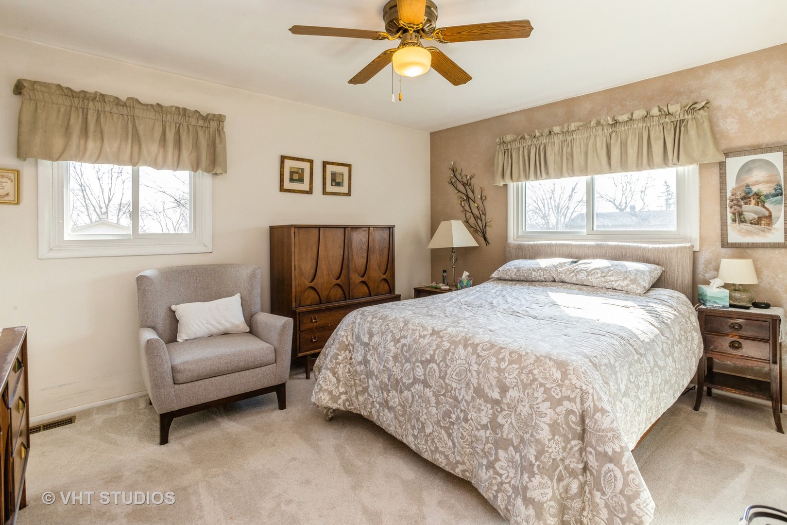 600 Edgemont Lane Hoffman Estates, IL 60169 - Photo 8 of 21 a spacious bedroom with a bed a couch and window