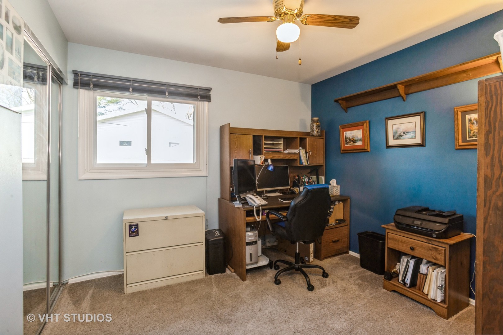 600 Edgemont Lane Hoffman Estates, IL 60169 - Photo 10 of 21 a view of a workspace with furniture and a window