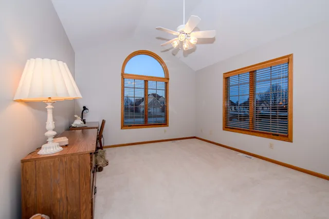 a kitchen with stainless steel appliances kitchen island granite countertop a sink and cabinets