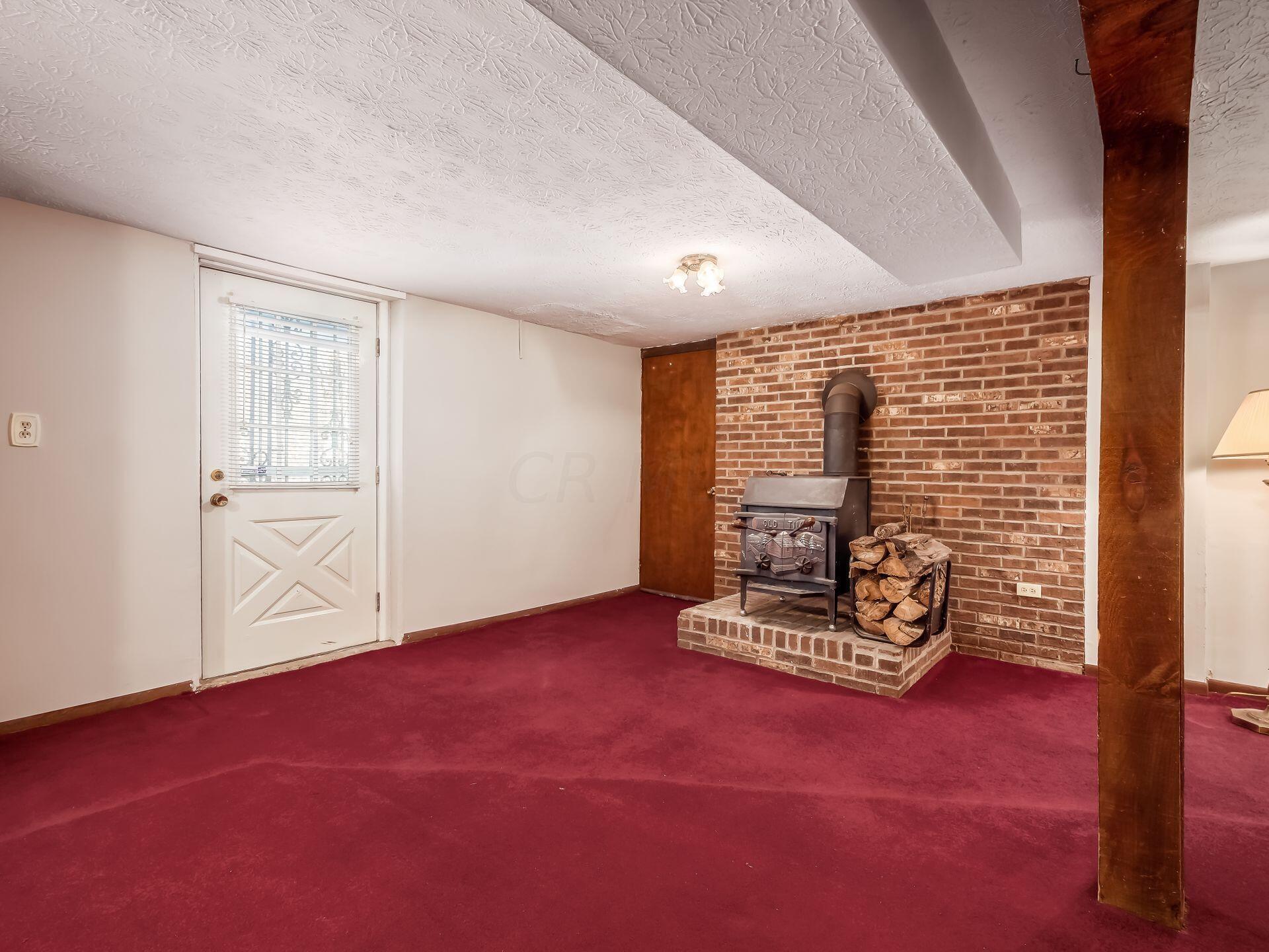 33 Main Road Delaware, OH 43015 - Photo 20 of 30 Finished basement w/door to backyard